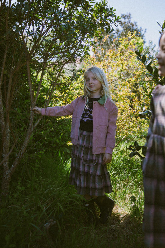 Girls pink cotton corduroy jacket with olive green contrast collar and oversized pockets by Little Harper Lee.
