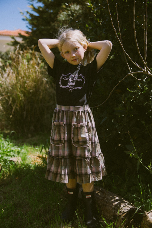 Girls' tartan cotton skirt with frill-trimmed feature pockets, elastic waistband and cotton muslin lining by Little Harper Lee.